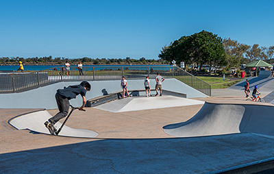 Kids using skateboarding ramp