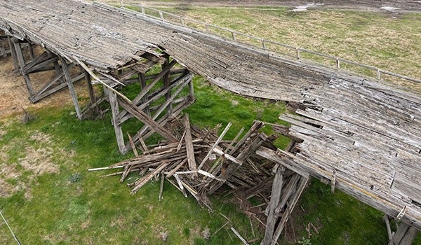 Picture of a broken wooden bridge. Picture of a broken wooden bridge.