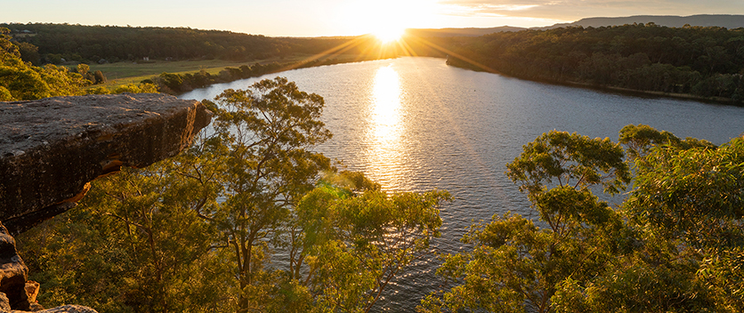 Sun setting over Hanging Rock Lookout and Shoalhaven River, Nowra. Credit: Destination NSW