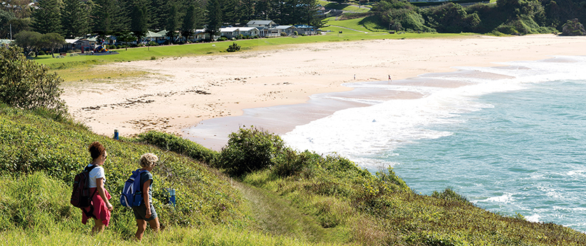 Two women walking along the Kiama coastal walk