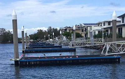 Boats moored at a marina.