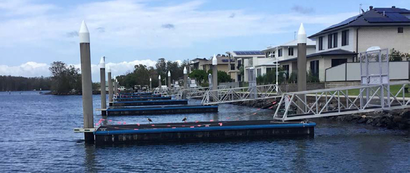 Boats moored at a marina.
