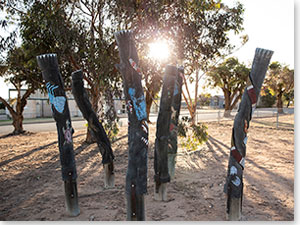 Aboriginal wood carvings near the Menindee Tourist Information Centre. Credit: Destination NSW