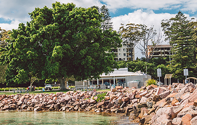 Shoreline and parklands outside Dolphin Watch Café, Nelsons Bay NSW