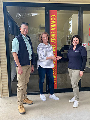 CECS President Peter Launders and General Manager Libby Ewing Jarvie receive the keys to the site from Crown Lands' Natalie Wilkinson