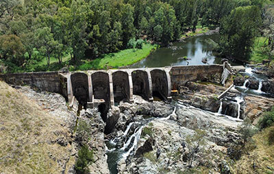 Water flowing over at Junction Reef Reserve dam. Credit: Ian Trethewey