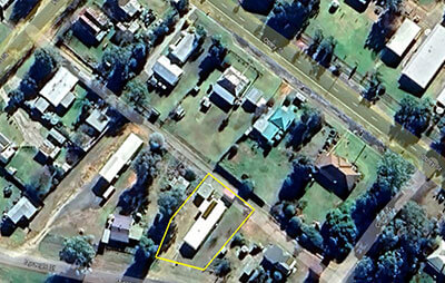 Aerial view of street map highlighting in yellow the men's shed