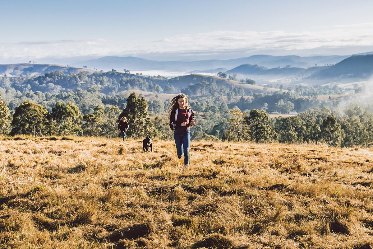 People walking on the grass, Dungog Common NSW. Credit: Shannon Richmond / DPE