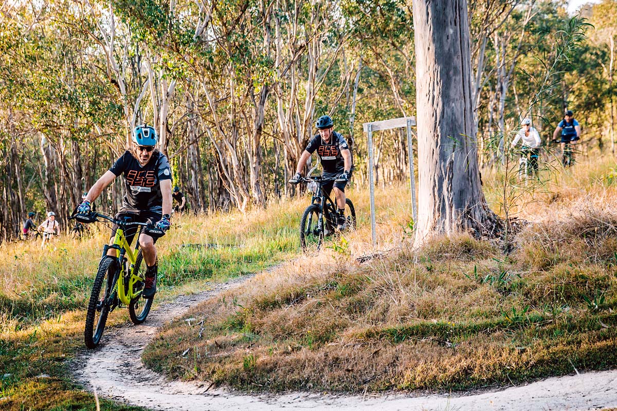 People riding bikes on the bike track, Dungog Common NSW. Credit: Shannon Richmond / DPE