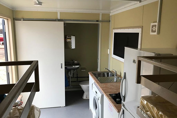 Interior of flood-recovery emergency accommodation Interior of flood-recovery emergency accommodation pod