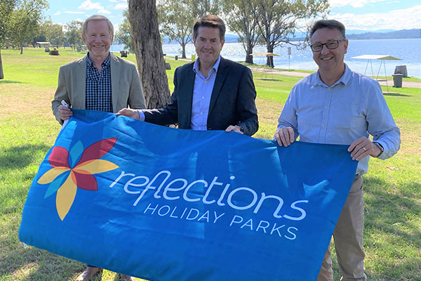 Reflections Holiday Parks CEO Nick-Baker, Minister for Lands and Water Kevin Anderson, Crown Lands North West Area Manager Danny Young at Lake Keepit.
